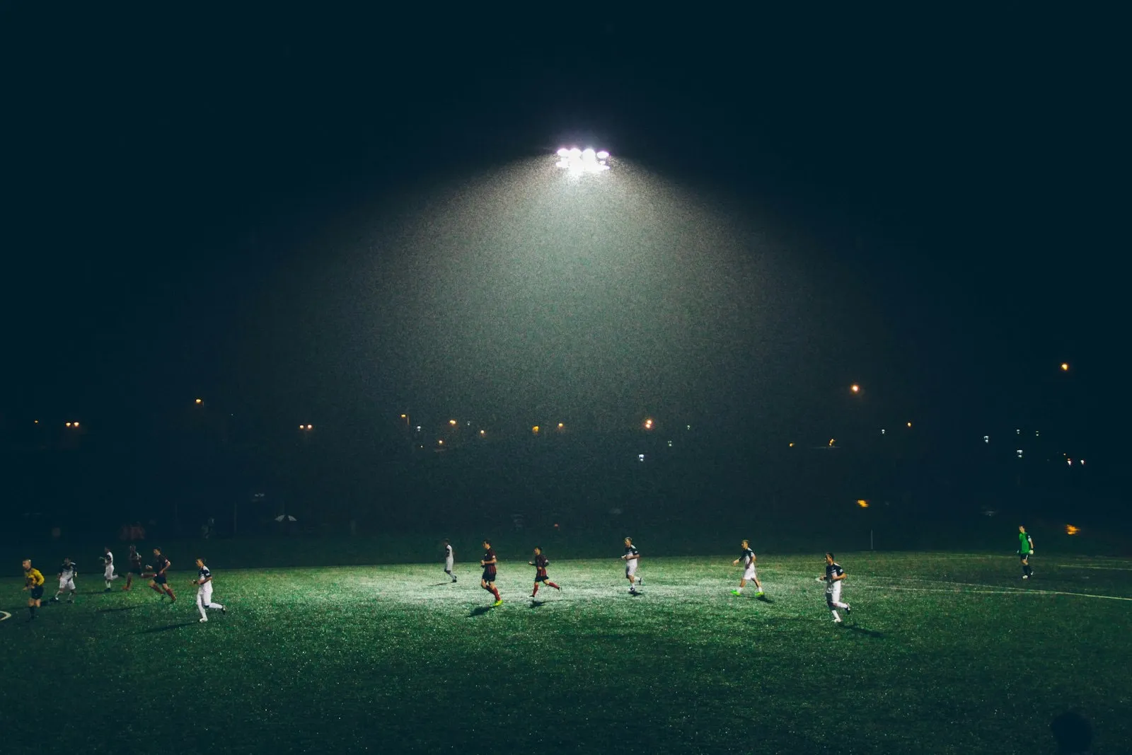 Floodlit football match at night — AI-powered sports degrees at IMPACT campus, Uttarakhand